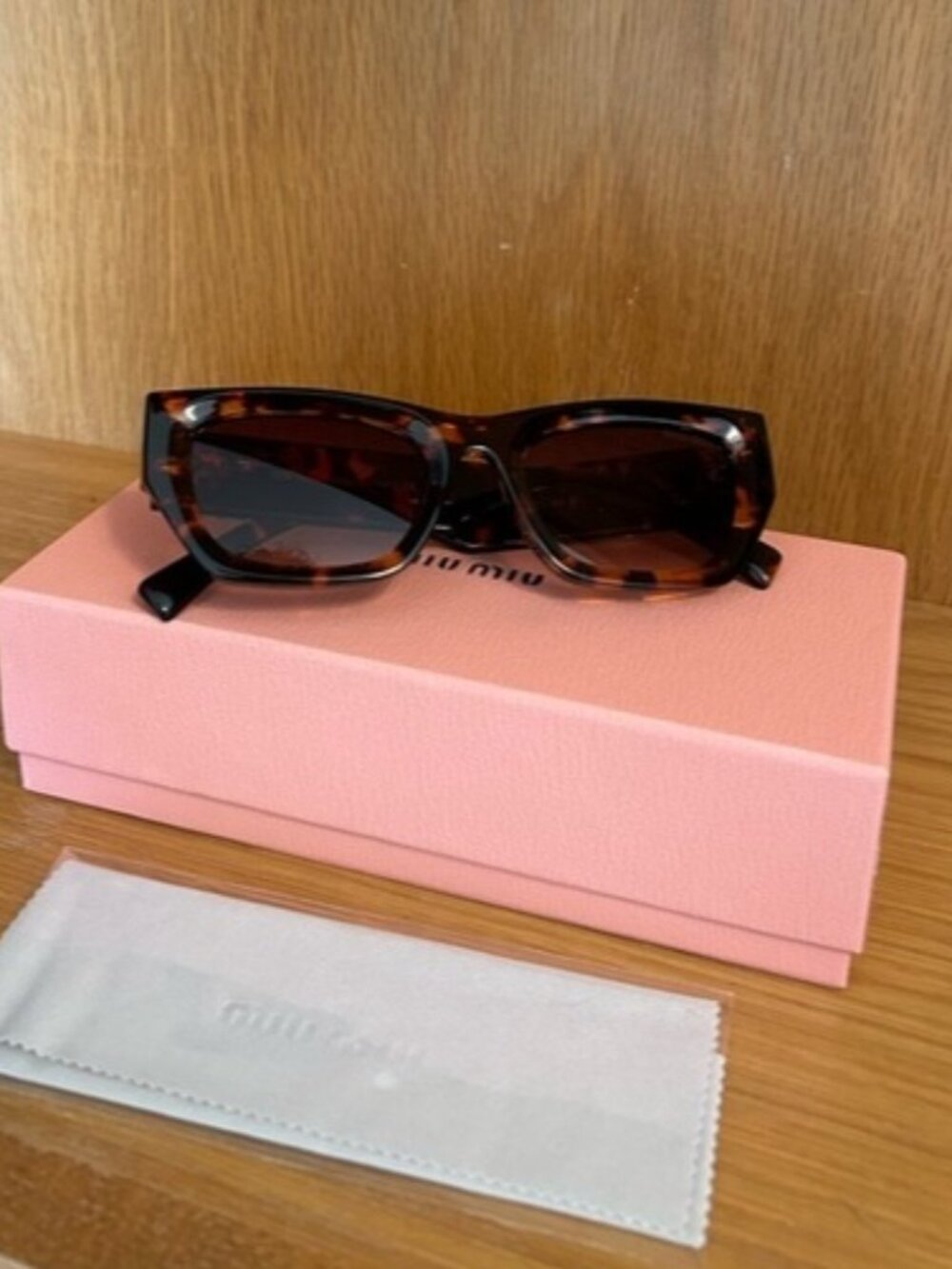 Miu Miu tortoise shell sunglasses